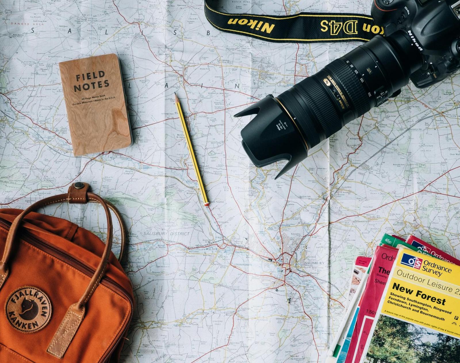 Maps and a notebook for trip planning